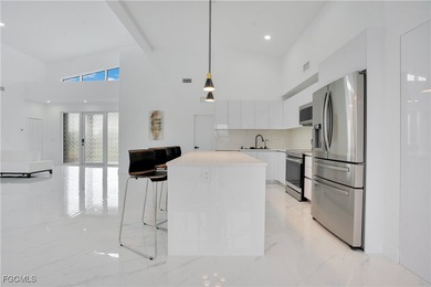 Direct Gulf Access Paradise - Where Every Day Begins on the on Burnt Store Golf Club in Florida - for sale on GolfHomes.com, golf home, golf lot