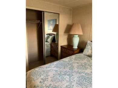 TIRED OF SNOW,ICE AND COLD, TRADE IT IN FOR SUN,WARM AND WHITE on Pine Lakes Country Club in Florida - for sale on GolfHomes.com, golf home, golf lot