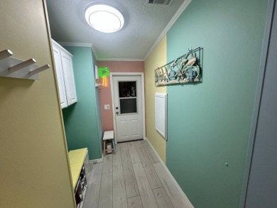 Lot Rent $1342.00 monthly  Beautiful stucco home located on a on Del Tura Golf and Country Club in Florida - for sale on GolfHomes.com, golf home, golf lot