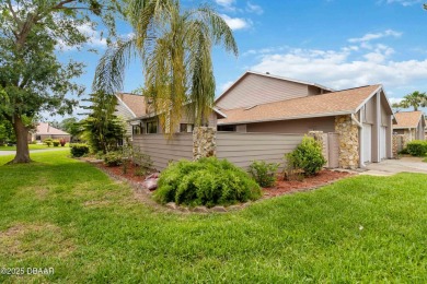 Welcome to maintenance-free living in the heart of Pelican Bay on The Club At Pelican Bay - North Course in Florida - for sale on GolfHomes.com, golf home, golf lot