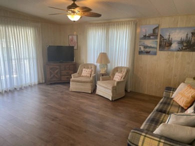 TIRED OF SNOW,ICE AND COLD, TRADE IT IN FOR SUN,WARM AND WHITE on Pine Lakes Country Club in Florida - for sale on GolfHomes.com, golf home, golf lot