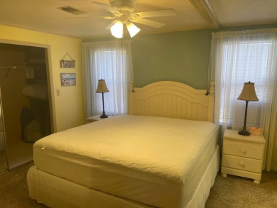 TIRED OF SNOW,ICE AND COLD, TRADE IT IN FOR SUN,WARM AND WHITE on Pine Lakes Country Club in Florida - for sale on GolfHomes.com, golf home, golf lot