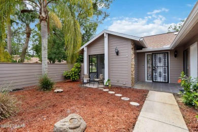 Welcome to maintenance-free living in the heart of Pelican Bay on The Club At Pelican Bay - North Course in Florida - for sale on GolfHomes.com, golf home, golf lot