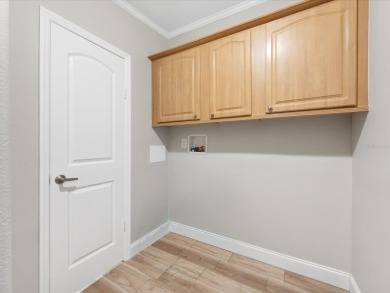 Welcome to this beautifully remodeled 3-bedroom, 2-bath home on Zellwood Station Country Club in Florida - for sale on GolfHomes.com, golf home, golf lot