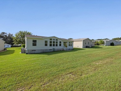 Welcome to this beautifully remodeled 3-bedroom, 2-bath home on Zellwood Station Country Club in Florida - for sale on GolfHomes.com, golf home, golf lot