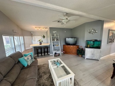 Lot Rent $1342.00 monthly  Beautiful stucco home located on a on Del Tura Golf and Country Club in Florida - for sale on GolfHomes.com, golf home, golf lot