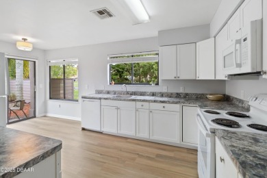 Welcome to maintenance-free living in the heart of Pelican Bay on The Club At Pelican Bay - North Course in Florida - for sale on GolfHomes.com, golf home, golf lot