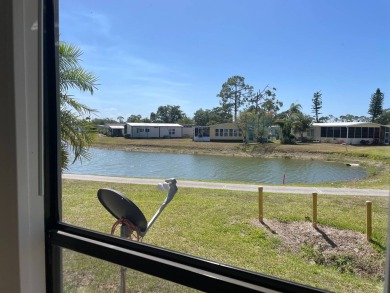 TIRED OF SNOW,ICE AND COLD, TRADE IT IN FOR SUN,WARM AND WHITE on Pine Lakes Country Club in Florida - for sale on GolfHomes.com, golf home, golf lot
