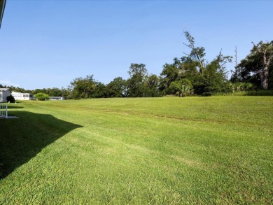 Welcome to this beautifully remodeled 3-bedroom, 2-bath home on Zellwood Station Country Club in Florida - for sale on GolfHomes.com, golf home, golf lot