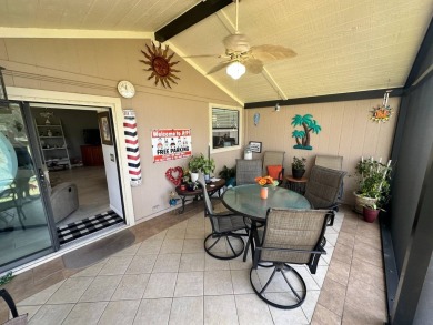 Lot Rent $1342.00 monthly  Beautiful stucco home located on a on Del Tura Golf and Country Club in Florida - for sale on GolfHomes.com, golf home, golf lot