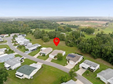 Welcome to this beautifully remodeled 3-bedroom, 2-bath home on Zellwood Station Country Club in Florida - for sale on GolfHomes.com, golf home, golf lot