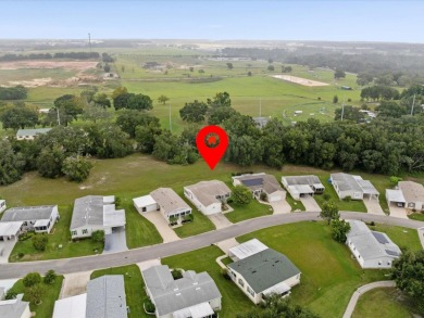 Welcome to this beautifully remodeled 3-bedroom, 2-bath home on Zellwood Station Country Club in Florida - for sale on GolfHomes.com, golf home, golf lot