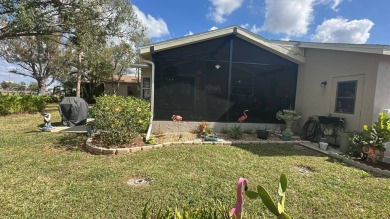 Lot Rent $1342.00 monthly  Beautiful stucco home located on a on Del Tura Golf and Country Club in Florida - for sale on GolfHomes.com, golf home, golf lot