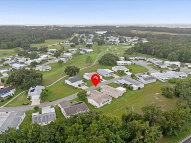 Welcome to this beautifully remodeled 3-bedroom, 2-bath home on Zellwood Station Country Club in Florida - for sale on GolfHomes.com, golf home, golf lot