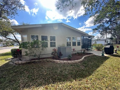 Lot Rent $1342.00 monthly  Beautiful stucco home located on a on Del Tura Golf and Country Club in Florida - for sale on GolfHomes.com, golf home, golf lot