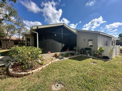 Lot Rent $1342.00 monthly  Beautiful stucco home located on a on Del Tura Golf and Country Club in Florida - for sale on GolfHomes.com, golf home, golf lot