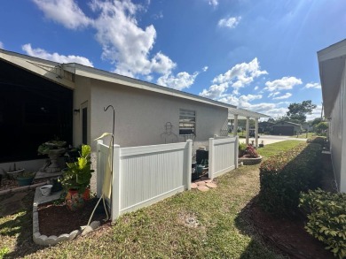 Lot Rent $1342.00 monthly  Beautiful stucco home located on a on Del Tura Golf and Country Club in Florida - for sale on GolfHomes.com, golf home, golf lot