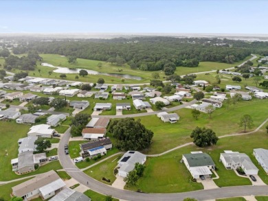 Welcome to this beautifully remodeled 3-bedroom, 2-bath home on Zellwood Station Country Club in Florida - for sale on GolfHomes.com, golf home, golf lot