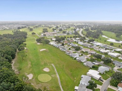 Welcome to this beautifully remodeled 3-bedroom, 2-bath home on Zellwood Station Country Club in Florida - for sale on GolfHomes.com, golf home, golf lot