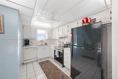 Beautiful 2-bedroom, 2-bath, 1,050 sq. ft. condo located in the on Deer Creek Golf Club in Florida - for sale on GolfHomes.com, golf home, golf lot