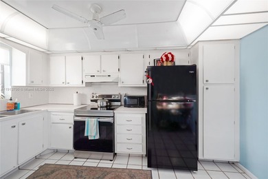 Beautiful 2-bedroom, 2-bath, 1,050 sq. ft. condo located in the on Deer Creek Golf Club in Florida - for sale on GolfHomes.com, golf home, golf lot