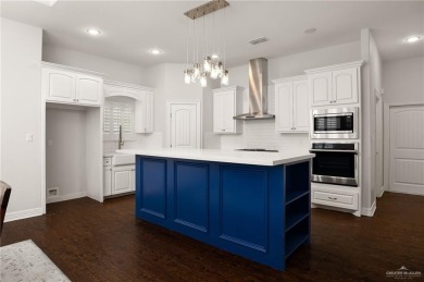 Welcome to this beautiful two-story brick home, ideally situated on Los Lagos Golf Club in Texas - for sale on GolfHomes.com, golf home, golf lot