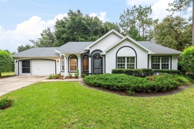 Welcome home to your little sanctuary tucked along the edge of a on Royal Oaks Golf Club in Florida - for sale on GolfHomes.com, golf home, golf lot
