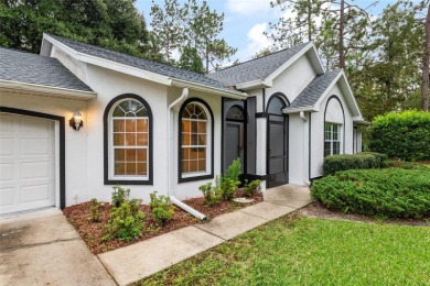 Welcome home to your little sanctuary tucked along the edge of a on Royal Oaks Golf Club in Florida - for sale on GolfHomes.com, golf home, golf lot