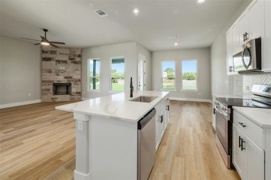 The Longhorn floorplan is spacious and open with patio and porch on Delaware Springs Golf Course in Texas - for sale on GolfHomes.com, golf home, golf lot