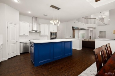 Welcome to this beautiful two-story brick home, ideally situated on Los Lagos Golf Club in Texas - for sale on GolfHomes.com, golf home, golf lot