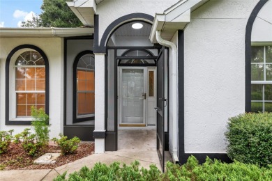 Welcome home to your little sanctuary tucked along the edge of a on Royal Oaks Golf Club in Florida - for sale on GolfHomes.com, golf home, golf lot