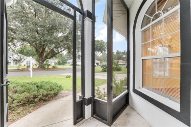 Welcome home to your little sanctuary tucked along the edge of a on Royal Oaks Golf Club in Florida - for sale on GolfHomes.com, golf home, golf lot