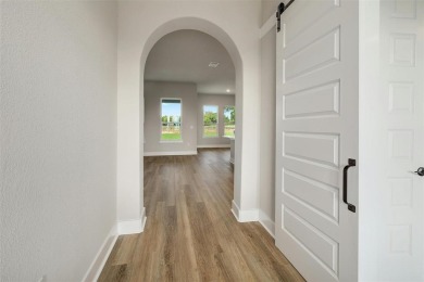 The Longhorn floorplan is spacious and open with patio and porch on Delaware Springs Golf Course in Texas - for sale on GolfHomes.com, golf home, golf lot