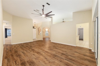 Welcome home to your little sanctuary tucked along the edge of a on Royal Oaks Golf Club in Florida - for sale on GolfHomes.com, golf home, golf lot