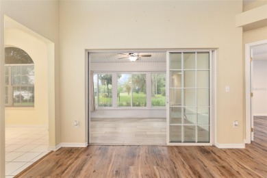 Welcome home to your little sanctuary tucked along the edge of a on Royal Oaks Golf Club in Florida - for sale on GolfHomes.com, golf home, golf lot