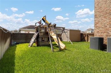 Welcome to this beautiful two-story brick home, ideally situated on Los Lagos Golf Club in Texas - for sale on GolfHomes.com, golf home, golf lot