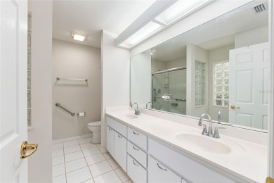 Welcome home to your little sanctuary tucked along the edge of a on Royal Oaks Golf Club in Florida - for sale on GolfHomes.com, golf home, golf lot