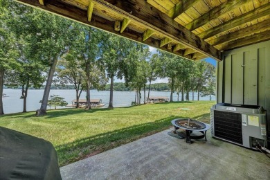 Enjoy beautiful Smith Mountain Lake in the worry free community on The Waterfront Country Club in Virginia - for sale on GolfHomes.com, golf home, golf lot