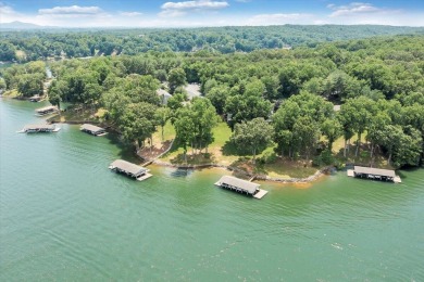 Enjoy beautiful Smith Mountain Lake in the worry free community on The Waterfront Country Club in Virginia - for sale on GolfHomes.com, golf home, golf lot