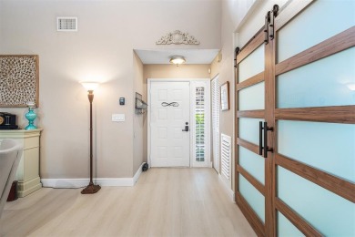This impeccably remodeled 3 bdr residence is a true standout In on Woodmont Country Club in Florida - for sale on GolfHomes.com, golf home, golf lot