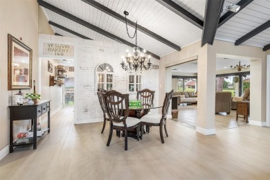 This impeccably remodeled 3 bdr residence is a true standout In on Woodmont Country Club in Florida - for sale on GolfHomes.com, golf home, golf lot