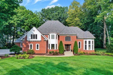Nestled on an exquisite one-acre property in Carmel, Indiana on Wood Wind Golf Club in Indiana - for sale on GolfHomes.com, golf home, golf lot