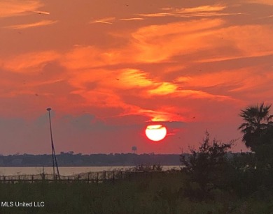 Come build your dream home on this large waterfront lot near on Pass Christian Isles Golf Club in Mississippi - for sale on GolfHomes.com, golf home, golf lot