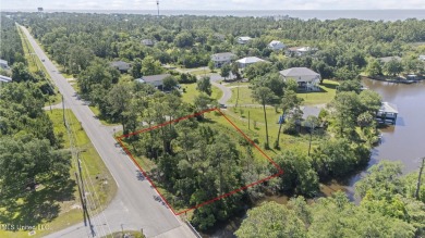 Come build your dream home on this large waterfront lot near on Pass Christian Isles Golf Club in Mississippi - for sale on GolfHomes.com, golf home, golf lot