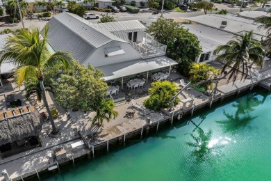 Experience the ultimate in Florida Keys living with this coveted on Key Colony Beach Golf Course in Florida - for sale on GolfHomes.com, golf home, golf lot