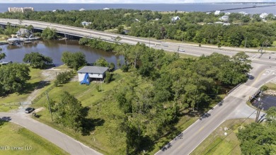 Come build your dream home on this large waterfront lot near on Pass Christian Isles Golf Club in Mississippi - for sale on GolfHomes.com, golf home, golf lot