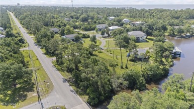 Come build your dream home on this large waterfront lot near on Pass Christian Isles Golf Club in Mississippi - for sale on GolfHomes.com, golf home, golf lot
