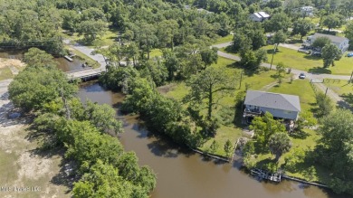 Come build your dream home on this large waterfront lot near on Pass Christian Isles Golf Club in Mississippi - for sale on GolfHomes.com, golf home, golf lot
