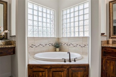 Welcome to this beautifully updated 4-bedroom, 3.5-bath home in on Trophy Club of Dallas in Texas - for sale on GolfHomes.com, golf home, golf lot