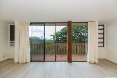 This coveted first-floor *A* unit (2BR/1BA) is ideally located on Makaha Valley Country Club in Hawaii - for sale on GolfHomes.com, golf home, golf lot